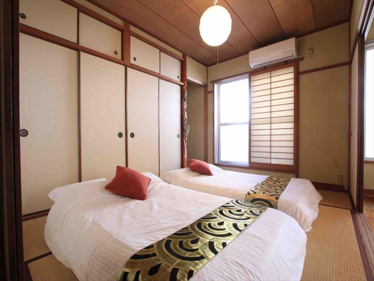 Appartamento Goraku Shinfu-Kae Osaka Esterno foto
