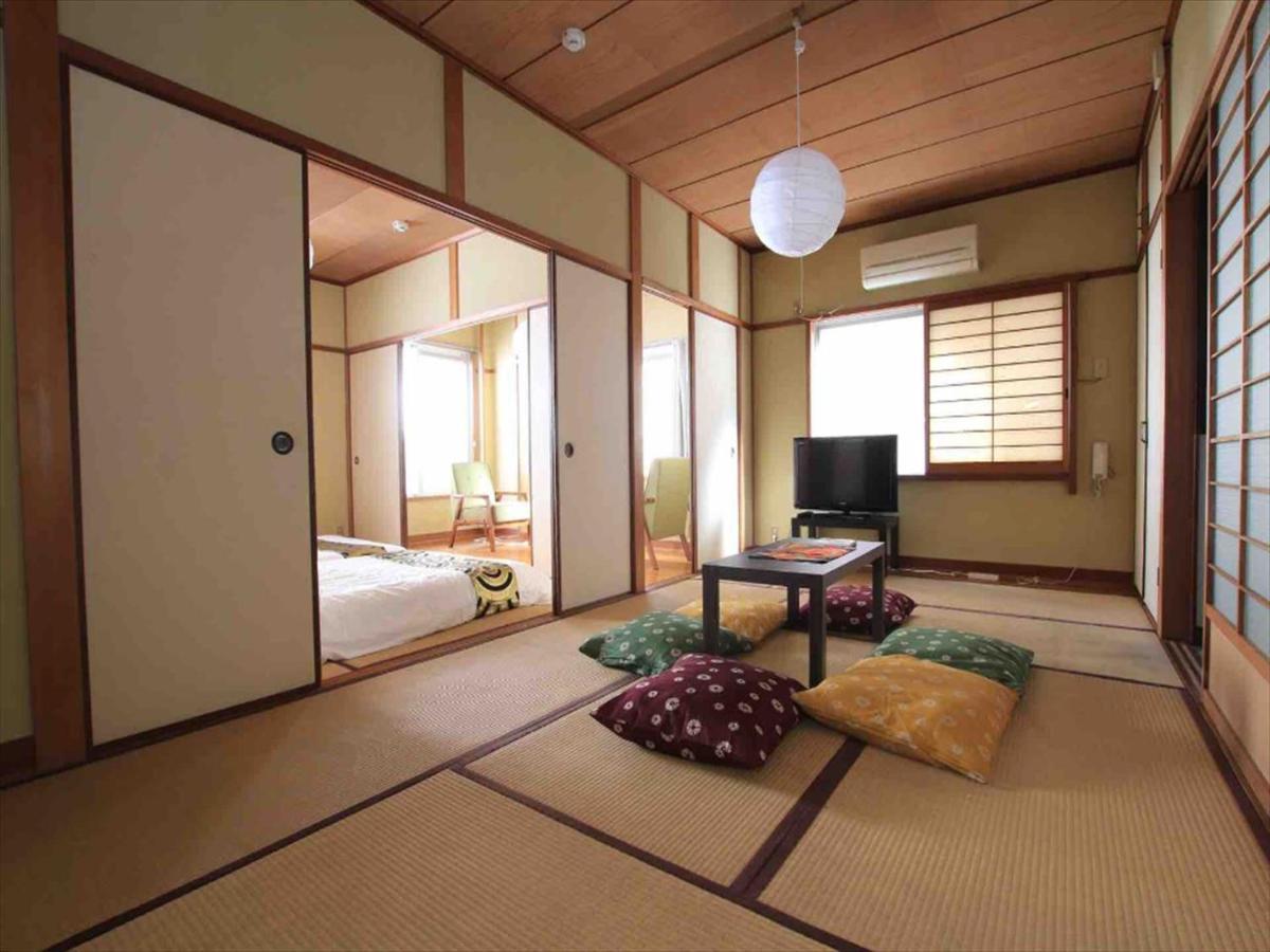 Appartamento Goraku Shinfu-Kae Osaka Esterno foto